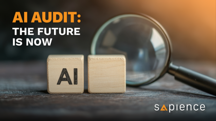 Two wooden blocks spelling "AI" (Artificial Intelligence) are positioned next to a large magnifying glass on a dark, textured surface, symbolizing the audit and scrutiny of AI systems. The text overlay reads "AI AUDIT: THE FUTURE IS NOW" in bold orange letters, and the Sapience logo is in the bottom right corner.